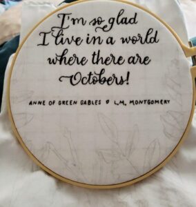 Graphite transfer onto fabric. Stitching of the quote already finished. Always stretch your work on a hoop for embroidery! Otherwise the fabric bunches. (as I learned)